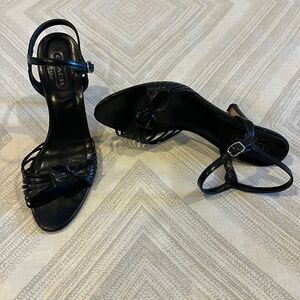 Coach Women’s Black Joelle Kid Leather Strappy Bow Sandal Heels